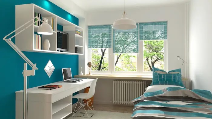 Image d'une chambre étudiante équipée et moderne, avec lit, étagère et bureau, un aménagement parfait pour louer à un étudiant